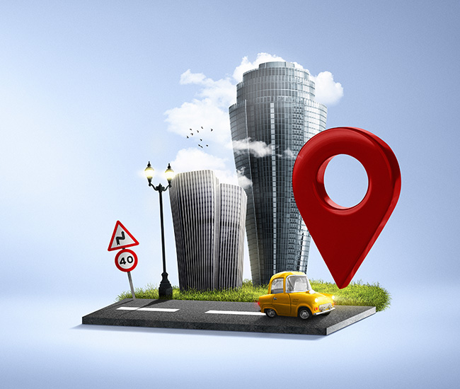 A person uses a laptop displaying a website builder interface, with a smartphone and tablet showing the same website design; green plants are visible at the top corners of the workspace.